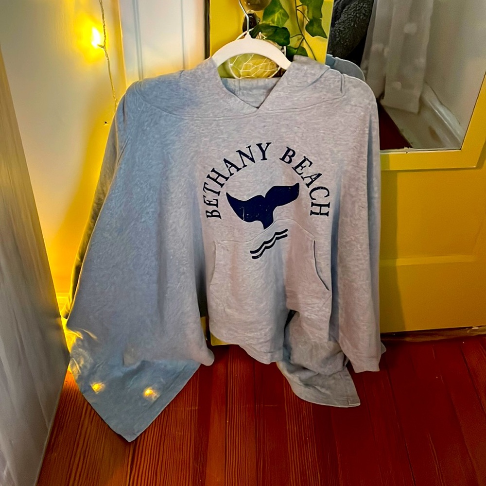 Blanket poncho sweater. Sleeveless, but with buttons to become blanket. So comfy